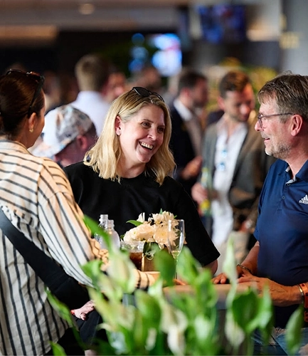 Official Hospitality guests chatting in the lounge