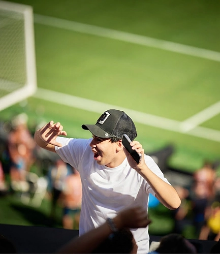 Fan cheering on the stands