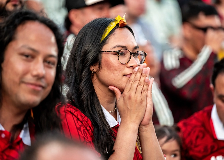 Fan rooting for their team