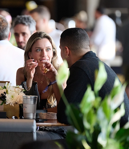 Guests discussing match at UEFA EURO 2028™ Official Hospitality